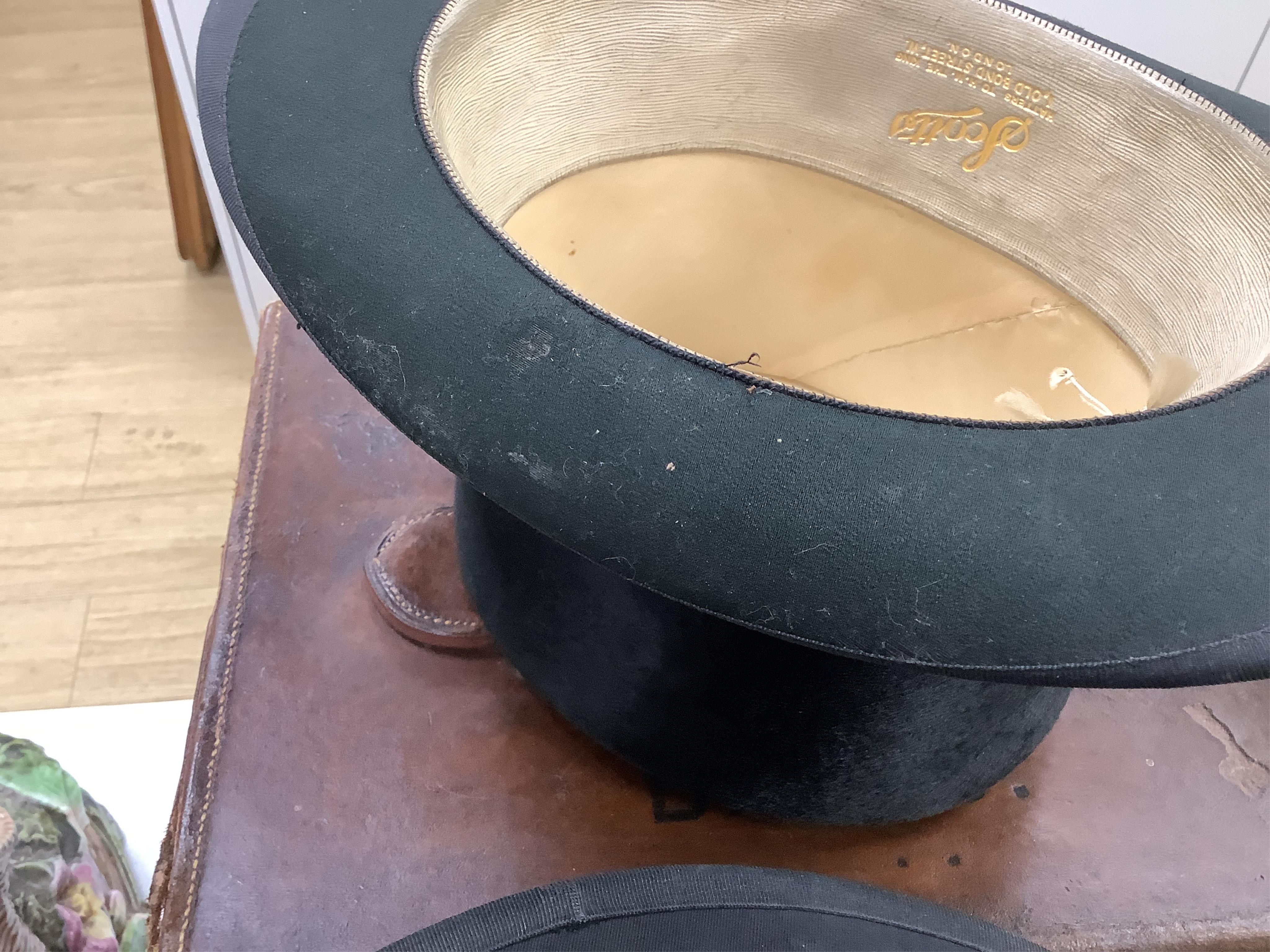 A Scott & Co. top hat with brush in leather case, together with a cased opera hat.